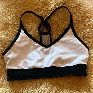 Pink active wear crop top in white with black trim size XS